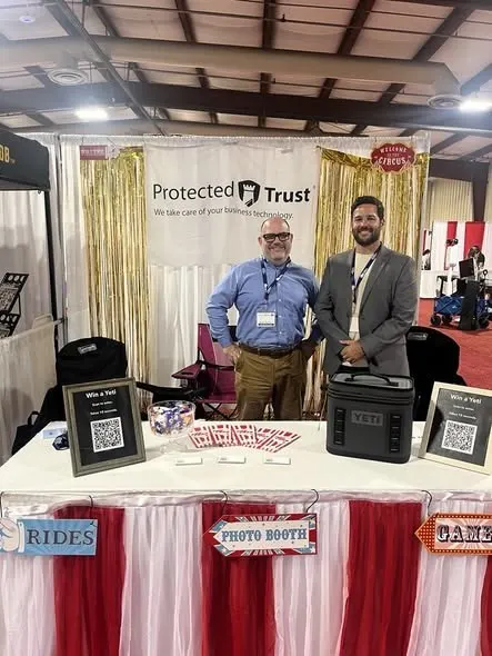 Two of our people at the Protected Trust booth at the ABC Construction Expo